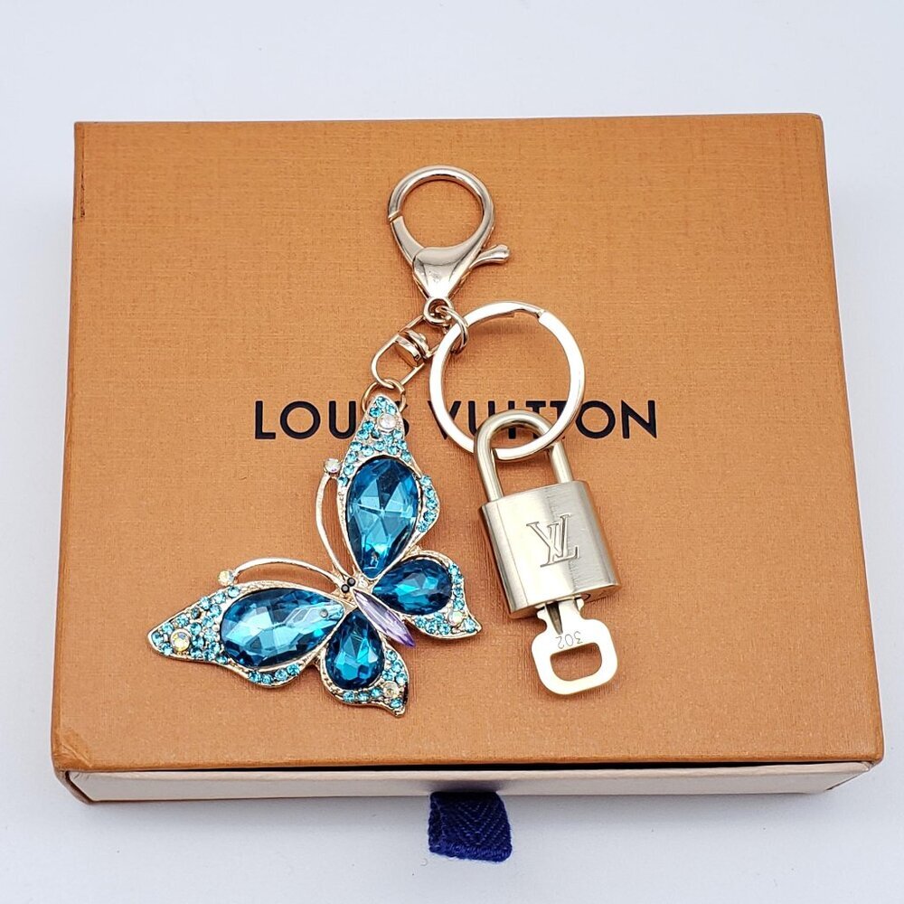 Authentic Louis Vuitton Gold Lock & Box w/ Unbranded Butterfly Bagcharm